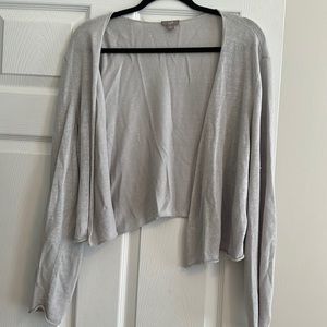 Overtop that covers arms on cool days/nights. It is so soft and looks great.
